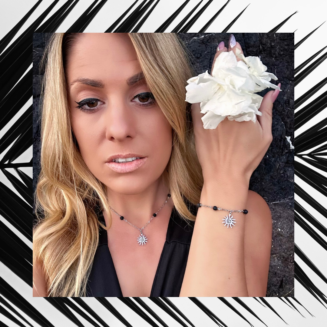 Exclusive Raw Lava Love Set by Infinity Muse Jewelry This exclusive necklace and bracelet set from Infinity Muse Jewelry combines modern minimalism with the raw energy of the earth. Each piece of jewelry can be purchased individually or as a complete set. Discover the exquisite combination of premium surgical steel and the raw energy of 4 mm natural lava stones, available in two variants — deep black or pure white.