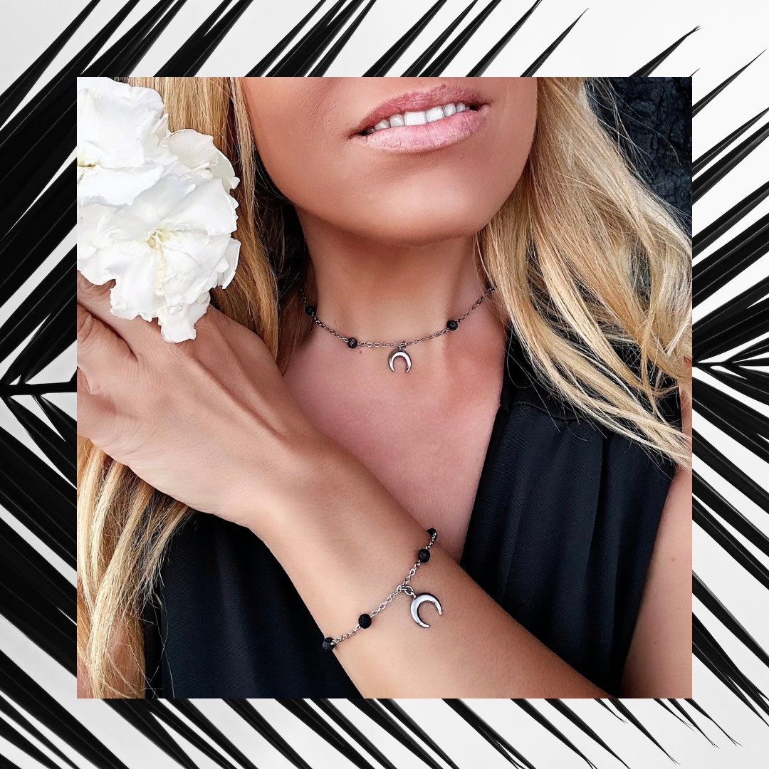 Exclusive Raw Lava Love Set by Infinity Muse Jewelry This exclusive necklace and bracelet set from Infinity Muse Jewelry combines modern minimalism with the raw energy of the earth. Each piece of jewelry can be purchased individually or as a complete set. Discover the exquisite combination of premium surgical steel and the raw energy of 4 mm natural lava stones, available in two variants — deep black or pure white.